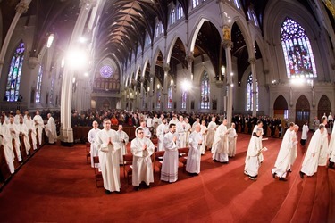 Ordination of transitional Deacons Jeffrey Archer, Steven Clemence, Peter DeFazio, George Fitzsimmons, Kevin Hickey, Karlo Hocurscak, Mark Storey, Lawrence Tocci and Jiwon Yoon Jan. 18, 2014 at the Cathedral of the Holy Cross. Pilot photo by Gregory L. Tracy 