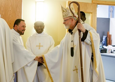 Incardination of Fathers Succès Jean-Pierre, Gabino Macias and Linus Mendis during Mass celebrated Feb. 28, 2014 at the Archdiocese of Boston's Pastoral Center in Braintree. Pilot photo/ Gregory L. Tracy