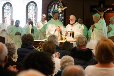 Incardination of Fathers Succès Jean-Pierre, Gabino Macias and Linus Mendis during Mass celebrated Feb. 28, 2014 at the Archdiocese of Boston's Pastoral Center in Braintree. Pilot photo/ Gregory L. Tracy