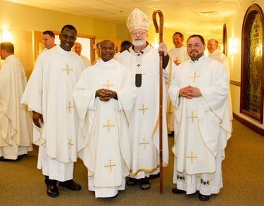 Incardination of Fathers Succès Jean-Pierre, Gabino Macias and Linus Mendis during Mass celebrated Feb. 28, 2014 at the Archdiocese of Boston's Pastoral Center in Braintree. Pilot photo/ Gregory L. Tracy