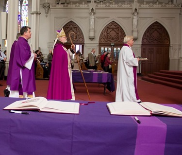 The Rite of Election and Call to Continuing Conversion for those who will be received into the Church at Easter is celebrated at the Cathedral of the Holy Cross March 9, 2014. (Pilot photo/ Christopher S. Pineo) 