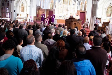 The Rite of Election and Call to Continuing Conversion for those who will be received into the Church at Easter is celebrated at the Cathedral of the Holy Cross March 9, 2014. (Pilot photo/ Christopher S. Pineo) 