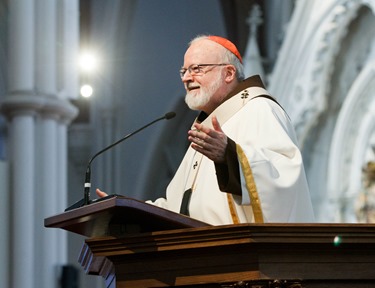 Cardinal Seán P. O'Malley celebrates Mass for the Feast of St. Patrick at the Cathedral of the Holy Cross March 17, 2014. 
Pilot photo/ Gregory L. Tracy