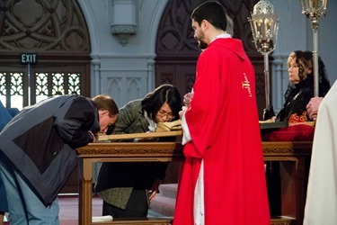 Good Friday Veneration of the Cross celebrated at the Cathedral of the Holy Cross April 18, 2014. Pilot photo/ Christopher S. Pineo 