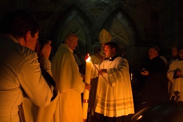 Easter Vigil, celebrated at the Cathedral of the Holy Cross April 19, 2014. Pilot photo/ Christopher S. Pineo 