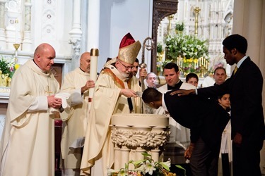 Easter Vigil, celebrated at the Cathedral of the Holy Cross April 19, 2014. Pilot photo/ Christopher S. Pineo 