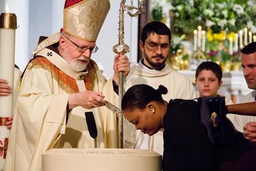 Easter Vigil, celebrated at the Cathedral of the Holy Cross April 19, 2014. Pilot photo/ Christopher S. Pineo 