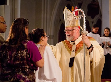 Easter Vigil, celebrated at the Cathedral of the Holy Cross April 19, 2014. Pilot photo/ Christopher S. Pineo 