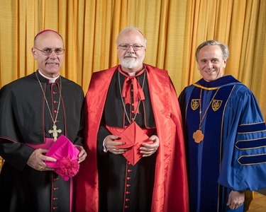 May 18, 2014; South Bend-Ft. Wayne diocese bishop Kevin Rhoades, Honorary degree recipient Cardinal Seán Patrick O’Malley and Notre Dame president Rev. John Jenkins, C.S.C. pose for a photo before the 2014 Commencement ceremony.

Photo by Matt Cashore/University of Notre Dame