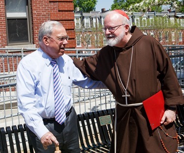 Dedication of a bench in honor of former Boston Mayor Thomas Menino outside Catholic Charities’ Teen Center at St. Peter’s in Dorchester May 12, 2014.  
Pilot photo/ Gregory L. Tracy 
