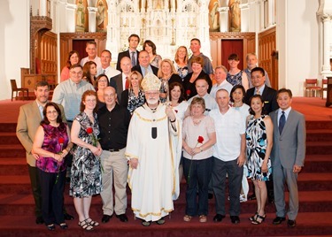 Couples celebrating 25, 50 and 60-plus years of marriage join a special Mass celebrated by Cardinal Seán P. O'Malley at the Cathedral of the Holy Cross June, 22, 2014.  At the Mass the cardinal led the couples in a renewal of vows. (Pilot photo/ Gregory L. Tracy)