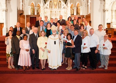 Couples celebrating 25, 50 and 60-plus years of marriage join a special Mass celebrated by Cardinal Seán P. O'Malley at the Cathedral of the Holy Cross June, 22, 2014.  At the Mass the cardinal led the couples in a renewal of vows. (Pilot photo/ Gregory L. Tracy)