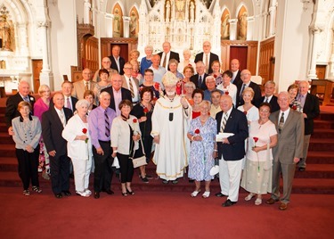 Couples celebrating 25, 50 and 60-plus years of marriage join a special Mass celebrated by Cardinal Seán P. O'Malley at the Cathedral of the Holy Cross June, 22, 2014.  At the Mass the cardinal led the couples in a renewal of vows. (Pilot photo/ Gregory L. Tracy)