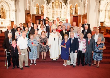 Couples celebrating 25, 50 and 60-plus years of marriage join a special Mass celebrated by Cardinal Seán P. O'Malley at the Cathedral of the Holy Cross June, 22, 2014.  At the Mass the cardinal led the couples in a renewal of vows. (Pilot photo/ Gregory L. Tracy)