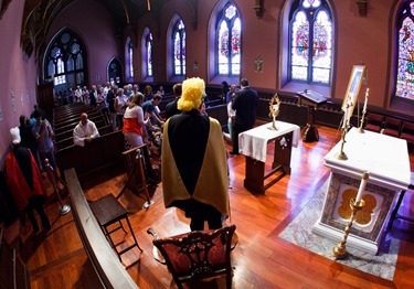 Hundreds of Catholic faithful came to venerate the relic of Pope St. John Paul II at the Cathedral of the Holy Cross June 22, 2014.  The relic was at the cathedral June 21 and 22 as the first stop on a national tour being sponsored by St. John Paul II National Shrine in Washington, D.C. and the Knights of Columbus. (Pilot photo by Gregory L. Tracy)