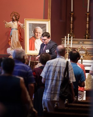 Hundreds of Catholic faithful came to venerate the relic of Pope St. John Paul II at the Cathedral of the Holy Cross June 22, 2014.  The relic was at the cathedral June 21 and 22 as the first stop on a national tour being sponsored by St. John Paul II National Shrine in Washington, D.C. and the Knights of Columbus. (Pilot photo by Gregory L. Tracy)