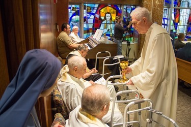 Cardinal Seán P. O'Malley and Boston Mayor Martin Walsh join the celebration of the 50th anniversary of Regina Cleri, the Archdiocese of Boston’s residence for senior priests in Boston’s West End June 5, 2014.
Pilot photo by Christopher S. Pineo 
