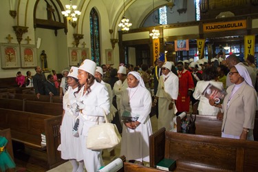 Cardinal Sean P. O’Malley and Cardinal Francis Arinze, who is from Nigeria, celebrate a Mass to mark the 25th anniversary of the Nigerian Catholic Community in the Archdiocese of Boston at St. Katharine Drexel Parish in Dorchester July 26, 2014. (Pilot photo/Christopher S. Pineo)