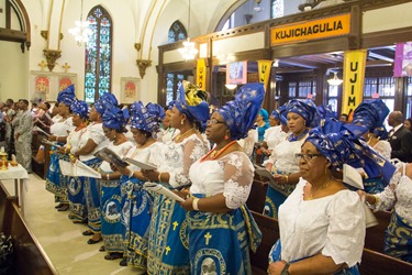 Cardinal Sean P. O’Malley and Cardinal Francis Arinze, who is from Nigeria, celebrate a Mass to mark the 25th anniversary of the Nigerian Catholic Community in the Archdiocese of Boston at St. Katharine Drexel Parish in Dorchester July 26, 2014. (Pilot photo/Christopher S. Pineo)