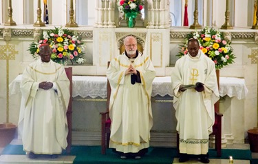 Cardinal Sean P. O’Malley and Cardinal Francis Arinze, who is from Nigeria, celebrate a Mass to mark the 25th anniversary of the Nigerian Catholic Community in the Archdiocese of Boston at St. Katharine Drexel Parish in Dorchester July 26, 2014. (Pilot photo/Christopher S. Pineo)