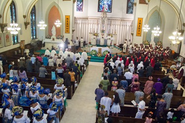 Cardinal Sean P. O’Malley and Cardinal Francis Arinze, who is from Nigeria, celebrate a Mass to mark the 25th anniversary of the Nigerian Catholic Community in the Archdiocese of Boston at St. Katharine Drexel Parish in Dorchester July 26, 2014. (Pilot photo/Christopher S. Pineo)