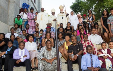 Cardinal Sean P. O’Malley and Cardinal Francis Arinze, who is from Nigeria, celebrate a Mass to mark the 25th anniversary of the Nigerian Catholic Community in the Archdiocese of Boston at St. Katharine Drexel Parish in Dorchester July 26, 2014. (Pilot photo/Christopher S. Pineo)