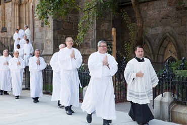 Cardinal Seán P. O'Malley ordains 13 men as permanent deacons at the Cathedral of the Holy Cross Sept. 20, 2014. The newly ordained are: Deacons Francis X. Burke, Michael F. Curren, William A. Dwyer, George C. Escotto, Edward S. Giordano, Charles A. Hall, Franklin A. Mejia, Eric T. Peabody, Jesús M. Pena, Álvaro José L. Soares, Michael P. Tompkins, Jude Tam V. Tran, and Carlos S. Valentin.
Pilot photo/ Gregory L. Tracy 
