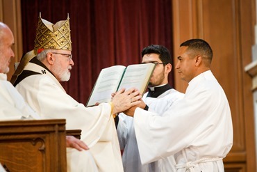 Cardinal Seán P. O'Malley ordains 13 men as permanent deacons at the Cathedral of the Holy Cross Sept. 20, 2014. The newly ordained are: Deacons Francis X. Burke, Michael F. Curren, William A. Dwyer, George C. Escotto, Edward S. Giordano, Charles A. Hall, Franklin A. Mejia, Eric T. Peabody, Jesús M. Pena, Álvaro José L. Soares, Michael P. Tompkins, Jude Tam V. Tran, and Carlos S. Valentin.
Pilot photo/ Gregory L. Tracy 
