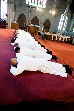 Cardinal Seán P. O'Malley ordains 13 men as permanent deacons at the Cathedral of the Holy Cross Sept. 20, 2014. The newly ordained are: Deacons Francis X. Burke, Michael F. Curren, William A. Dwyer, George C. Escotto, Edward S. Giordano, Charles A. Hall, Franklin A. Mejia, Eric T. Peabody, Jesús M. Pena, Álvaro José L. Soares, Michael P. Tompkins, Jude Tam V. Tran, and Carlos S. Valentin.
Pilot photo/ Gregory L. Tracy 
