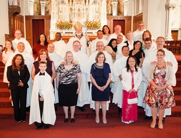 Cardinal Seán P. O'Malley ordains 13 men as permanent deacons at the Cathedral of the Holy Cross Sept. 20, 2014. The newly ordained are: Deacons Francis X. Burke, Michael F. Curren, William A. Dwyer, George C. Escotto, Edward S. Giordano, Charles A. Hall, Franklin A. Mejia, Eric T. Peabody, Jesús M. Pena, Álvaro José L. Soares, Michael P. Tompkins, Jude Tam V. Tran, and Carlos S. Valentin.
Pilot photo/ Gregory L. Tracy 
