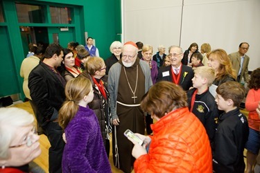 Cardinal Seán P. O'Malley presents the 2014 Cheverus Award Medals for service to the Church to 116 recipients at a Vespers Service at the Cathedral of the Holy Cross Nov. 23, 2014. Afterward, the cardinal joined the recipients and their families at a reception in neighboring Cathedral High School.<br />
Pilot photo/ Gregory L. Tracy<br />
