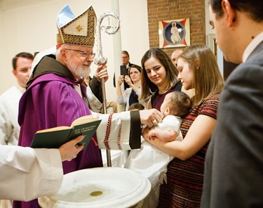 Baptism of Olivia Isabel Enrique at Our Lady of the Assumption Parish, East Boston, Jan. 4, 2015.
Photo by Gregory L. Tracy