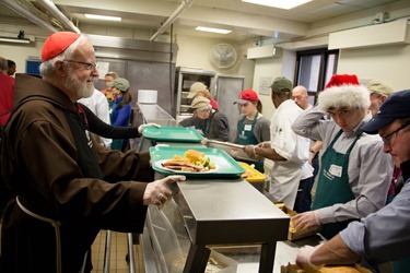 Cardinal Seán P. O'Malley visits Pine Street Inn homeless shelter in Boston Dec. 24, 2104.
Pilot photo/ Christopher S. Pineo 
