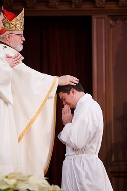 Cardinal Sean P. O’Malley ordains Anthony Cusack, Andrea Filippucci, Christopher Lowe, Peter Stamm, and Sinisa Ubiparipovic transitional deacons at the Cathedral of the Holy Cross Jan. 10, 2015.
Pilot photo/ Gregory L. Tracy 