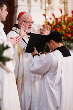 Cardinal Sean P. O’Malley ordains Anthony Cusack, Andrea Filippucci, Christopher Lowe, Peter Stamm, and Sinisa Ubiparipovic transitional deacons at the Cathedral of the Holy Cross Jan. 10, 2015.
Pilot photo/ Gregory L. Tracy 