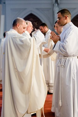 Cardinal Sean P. O’Malley ordains Anthony Cusack, Andrea Filippucci, Christopher Lowe, Peter Stamm, and Sinisa Ubiparipovic transitional deacons at the Cathedral of the Holy Cross Jan. 10, 2015.
Pilot photo/ Gregory L. Tracy 