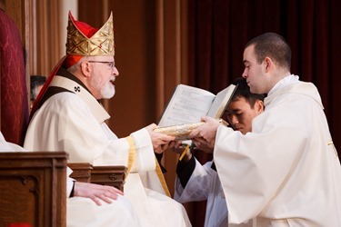 Cardinal Sean P. O’Malley ordains Anthony Cusack, Andrea Filippucci, Christopher Lowe, Peter Stamm, and Sinisa Ubiparipovic transitional deacons at the Cathedral of the Holy Cross Jan. 10, 2015.
Pilot photo/ Gregory L. Tracy 