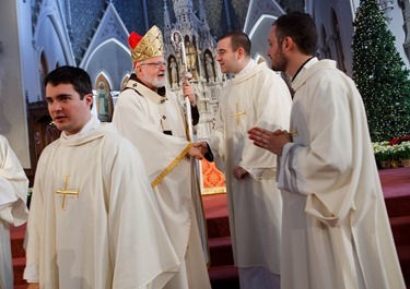 Cardinal Sean P. O’Malley ordains Anthony Cusack, Andrea Filippucci, Christopher Lowe, Peter Stamm, and Sinisa Ubiparipovic transitional deacons at the Cathedral of the Holy Cross Jan. 10, 2015.
Pilot photo/ Gregory L. Tracy 