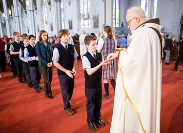 Cardinal Sean P. O'Malley celebrates the annual Chrism Mass at the Cathedral of the Holy Cross March 31, 2015.  The Mass at which the sacred oils are blessed is also an occasion to celebrate priestly fraternity. (Pilot photo/ Gregory L. Tracy)