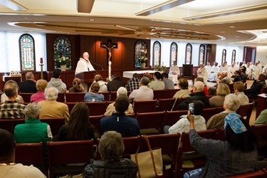 Cardinal Seán P. O'Malley formally accepts Father Garcia Brenneville as a priest of the Archdiocese of Boston in a ritual known as incardination at the archdiocese’s Pastoral Center April 7, 2015.  Father Brenneville is a native of Port-Au-Prince, Haiti, and he serves as parochial vicar at Christ the King Parish, St. Edith Stein Parish and Our Lady of Lourdes Parish in Brockton.  (Pilot photo/ Gregory L. Tracy)