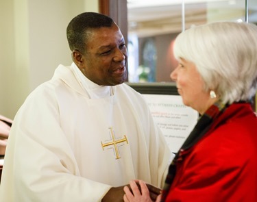 Cardinal Seán P. O'Malley formally accepts Father Garcia Brenneville as a priest of the Archdiocese of Boston in a ritual known as incardination at the archdiocese’s Pastoral Center April 7, 2015.  Father Brenneville is a native of Port-Au-Prince, Haiti, and he serves as parochial vicar at Christ the King Parish, St. Edith Stein Parish and Our Lady of Lourdes Parish in Brockton.  (Pilot photo/ Gregory L. Tracy)