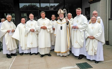 A Mass and festival was held Aug. 9, 2015 at St. Mary of the Assumption in Hull to mark three special occasions of the parish: the 5th anniversary of their feast day celebration, the 125th anniversary of the parish and the 100th anniversary of their church. 
Pilot photo/ Courtesy St. Mary of the Assumption Parish
