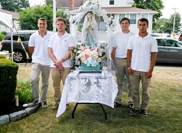 A Mass and festival was held Aug. 9, 2015 at St. Mary of the Assumption in Hull to mark three special occasions of the parish: the 5th anniversary of their feast day celebration, the 125th anniversary of the parish and the 100th anniversary of their church. 
Pilot photo/ Courtesy St. Mary of the Assumption Parish
