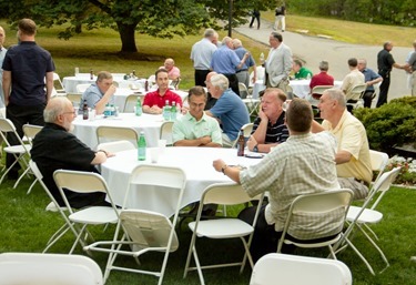 Boston clergy share priestly fraternity in a casual setting at the Annual St. John Vianney Cookout hosted by St. John Seminary, Aug. 6, 2015. The gathering began with a talk on the papal encyclical “Laudato Si’” by Father J. Bryan Hehir.
Pilot photo/ Christopher S. Pineo 
