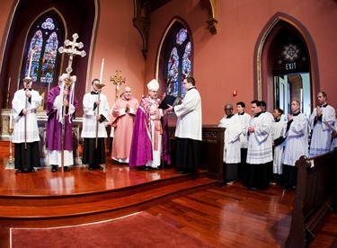 Vicar General Bishop Peter J. Uglietto celebrates a special Mass at the Cathedral of the Holy Cross Dec. 13, 2015 at which the holy door for the Extraordinary Jubilee Year of Mercy was opened. (Pilot photo/ Gregory L. Tracy)