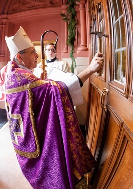 Vicar General Bishop Peter J. Uglietto celebrates a special Mass at the Cathedral of the Holy Cross Dec. 13, 2015 at which the holy door for the Extraordinary Jubilee Year of Mercy was opened. (Pilot photo/ Gregory L. Tracy)