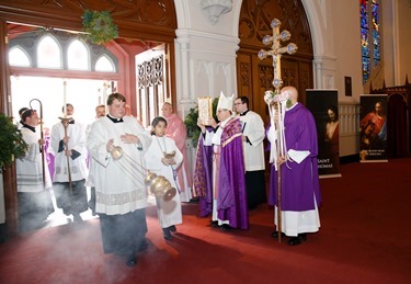 Vicar General Bishop Peter J. Uglietto celebrates a special Mass at the Cathedral of the Holy Cross Dec. 13, 2015 at which the holy door for the Extraordinary Jubilee Year of Mercy was opened. (Pilot photo/ Gregory L. Tracy)