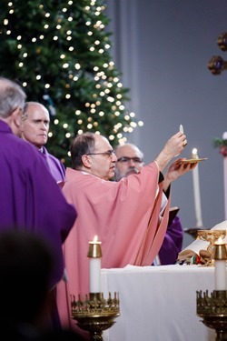 Vicar General Bishop Peter J. Uglietto celebrates a special Mass at the Cathedral of the Holy Cross Dec. 13, 2015 at which the holy door for the Extraordinary Jubilee Year of Mercy was opened. (Pilot photo/ Gregory L. Tracy)