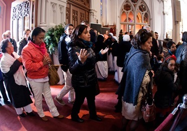 Vicar General Bishop Peter J. Uglietto celebrates a special Mass at the Cathedral of the Holy Cross Dec. 13, 2015 at which the holy door for the Extraordinary Jubilee Year of Mercy was opened. (Pilot photo/ Gregory L. Tracy)