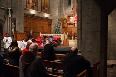 New Year's Eve Holy Hour and Mass celebrated by Cardinal Sean O'Malley at St. Clement's Eucharistic Shrine in Boston Dec. 31, 2015. Pilot photo/ Mark Labbe